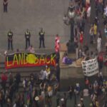 Le proteste degli attivisti per i diritti degli indigeni nell'Australia Day