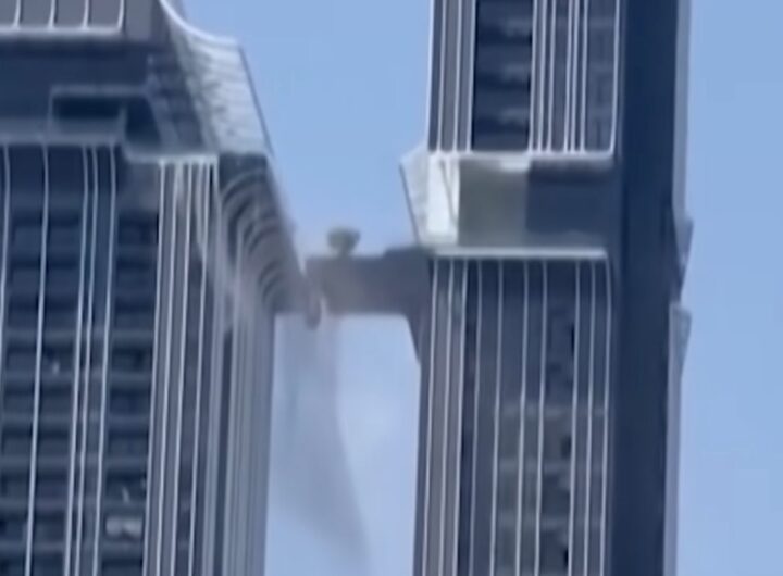 uomo salta tra grattacieli terremoto