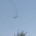 aeroplano col motore in fiamme