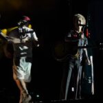 suona gli oasis al concerto dei green day