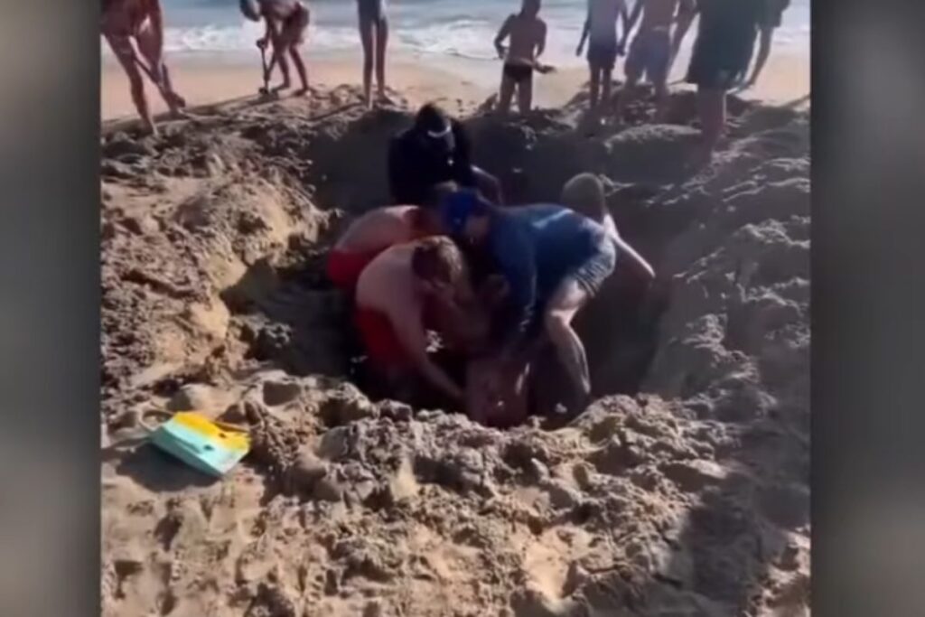 intrappolati buca in spiaggia