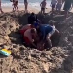 intrappolati buca in spiaggia
