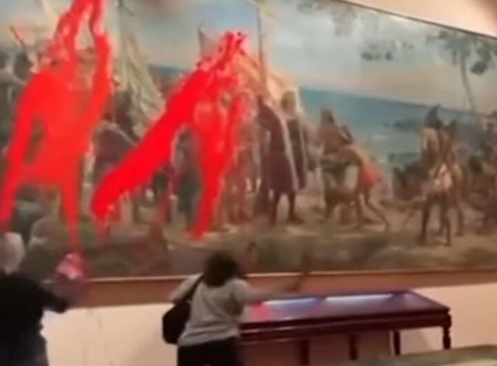 Attiviste a Madrid imbrattano dipinto di Cristoforo Colombo
