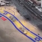 La scritta sulla spiaggia di Tel Aviv per l'arrivo del presidente Usa: "Grazie Trump"