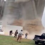 Crolla un gigantesco silos di grano, persone in fuga