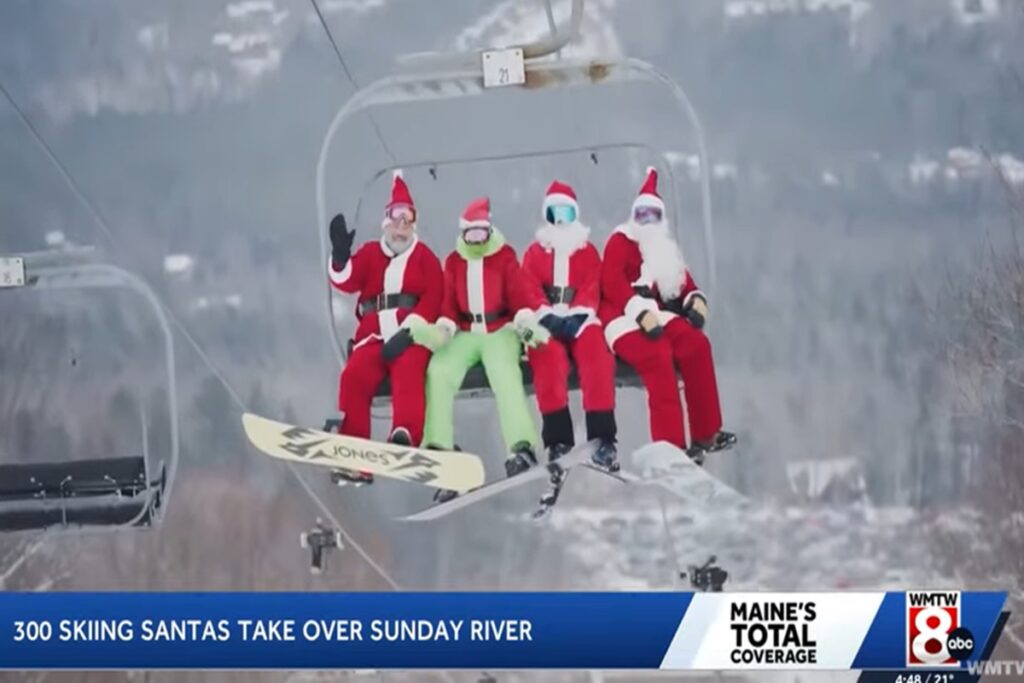 Il video di centinaia di sciatori vestiti da Babbo Natale per beneficienza