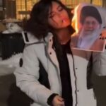 Donna iraniana protesta sui social accendendosi una sigarette con la foto in fiamme di Khamenei