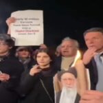 Renzi si accende una sigaretta con la foto in fiamme di Khamenei