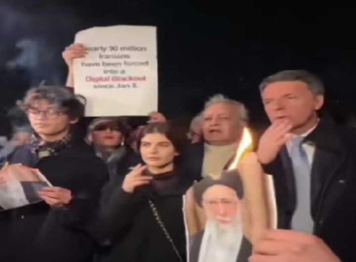 Renzi si accende una sigaretta con la foto in fiamme di Khamenei