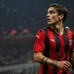 Zaniolo con la maglia del Milan, immagine creata con l'intelligenza artificiale