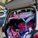 Auto piena di zaini