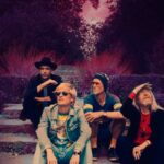 I quattro componenti dei Kula Shaker in una fotografia promozionale
