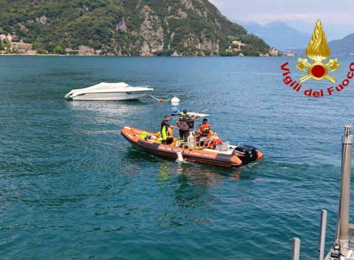 turista disperso lago como