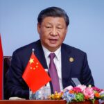 Xi