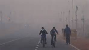 Ciclisti a New Delhi